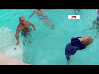video 57f6c3d4af41c reporter in the pool on live tv