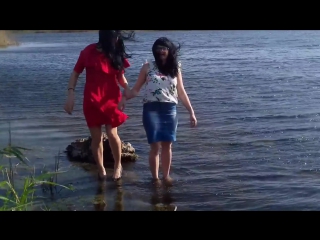 wetlook video super moms on the lake in skirts washing with clothes