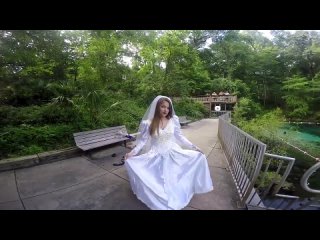 bride soaks her dress